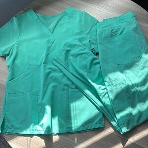 Used mint mandala scrub set